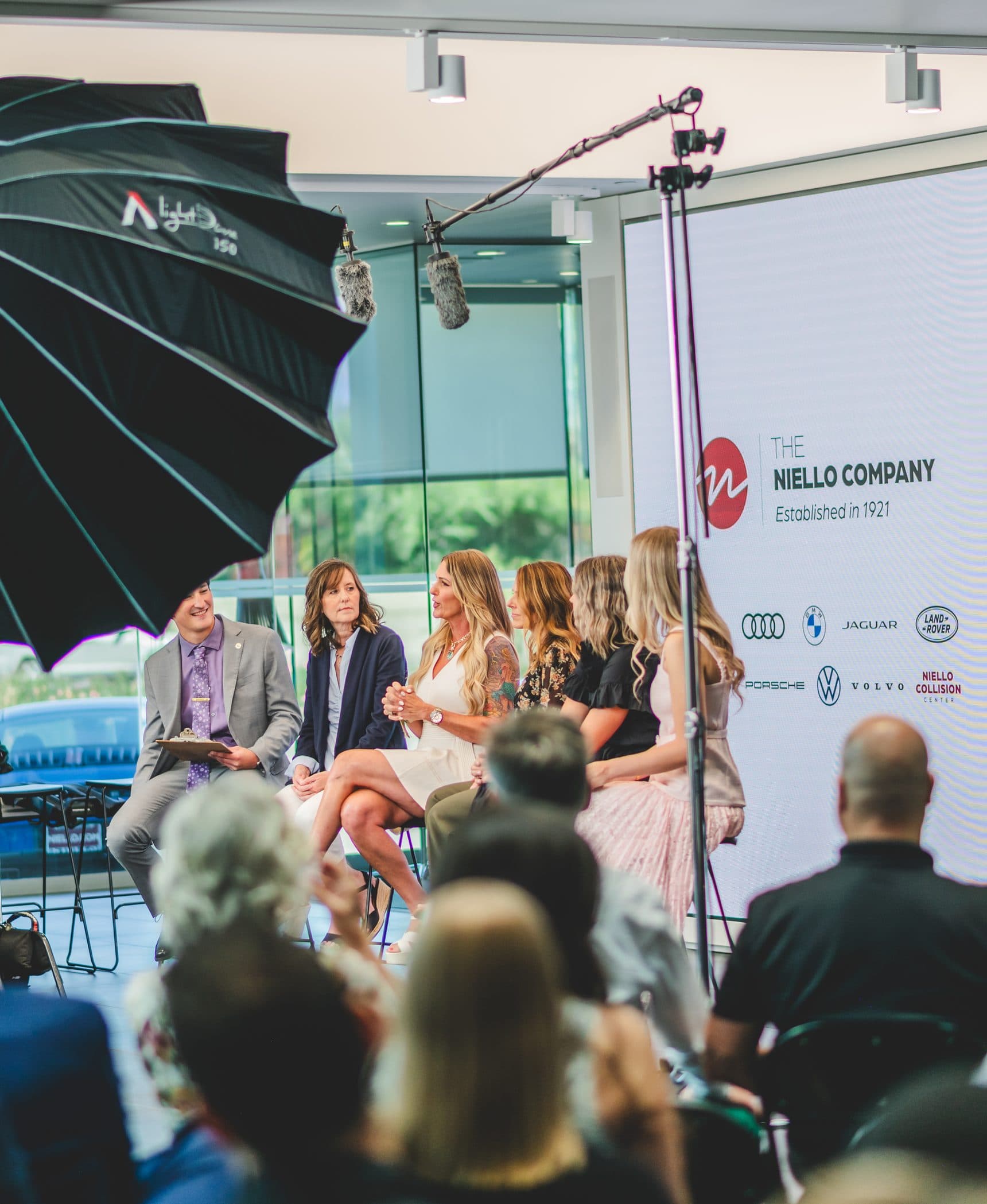 A Fixed Ops Roundtable audience and broadcast stage mid-session